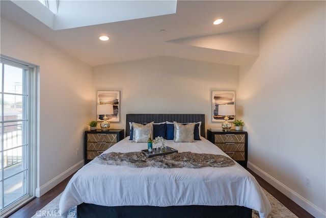 bedroom featuring dark hardwood / wood-style floors and vaulted ceiling