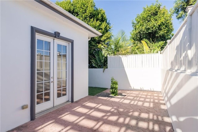 view of patio featuring french doors