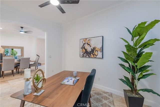 dining room featuring ornamental molding and ceiling fan