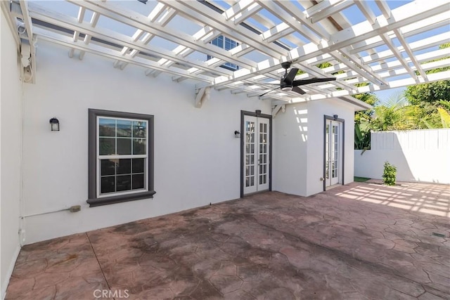 view of patio / terrace with a pergola and french doors