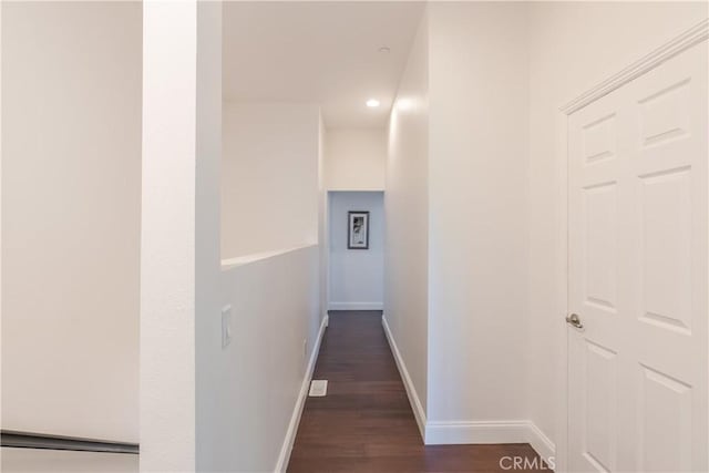 hall featuring dark wood-type flooring