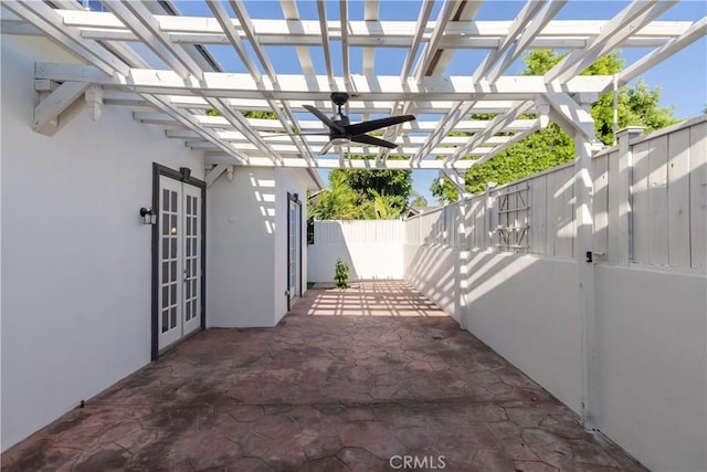 view of patio / terrace with french doors and a pergola