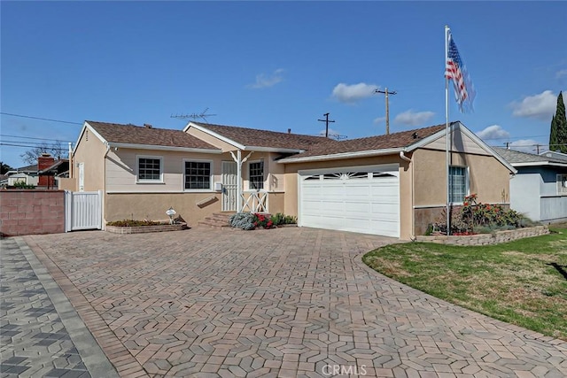 ranch-style home featuring a garage