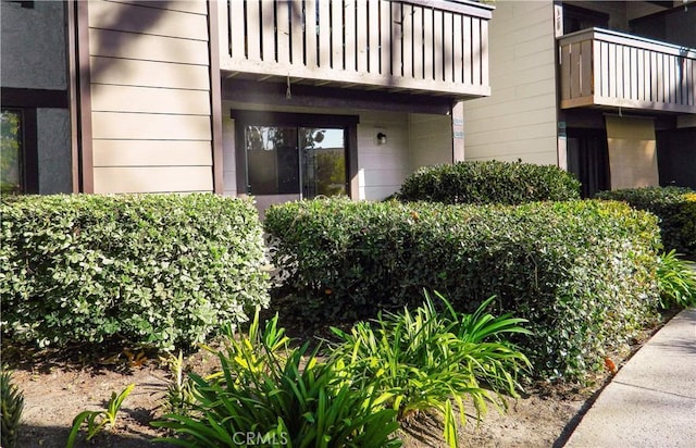 property entrance with a balcony