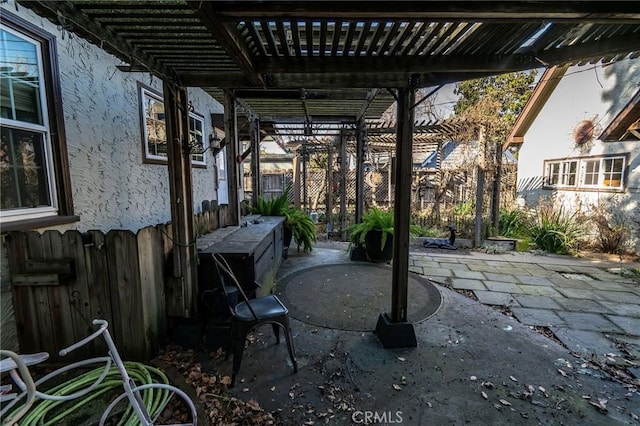 view of patio / terrace featuring a pergola