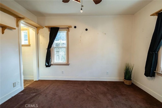 carpeted empty room with ceiling fan