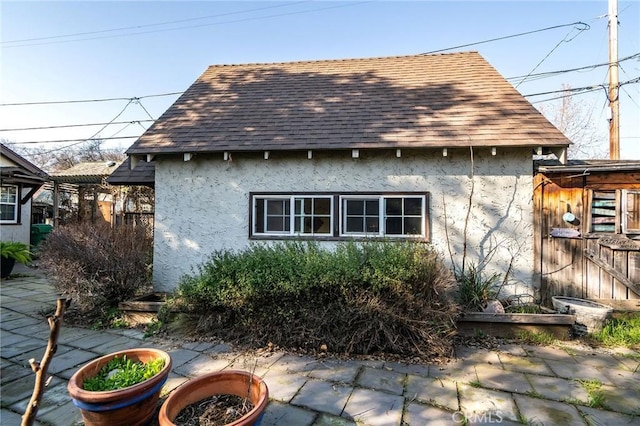 back of house featuring a patio