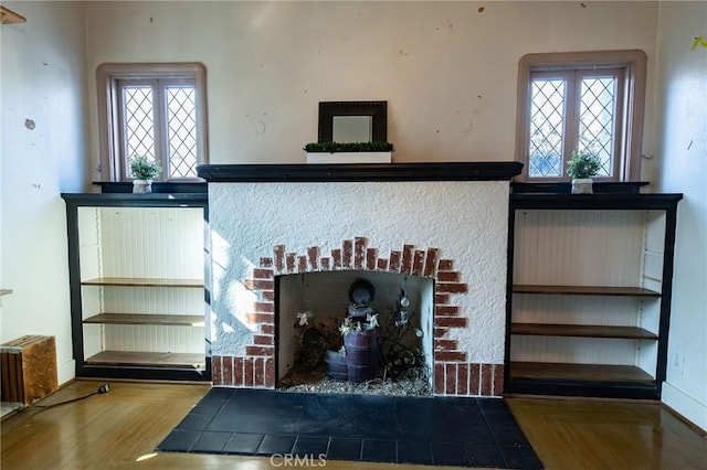 interior details with parquet floors and a fireplace