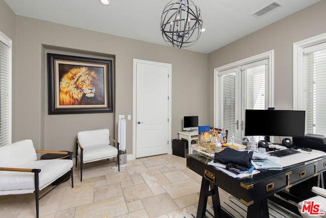 office area featuring a chandelier