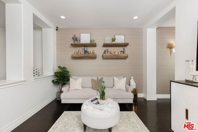 living room with dark hardwood / wood-style floors