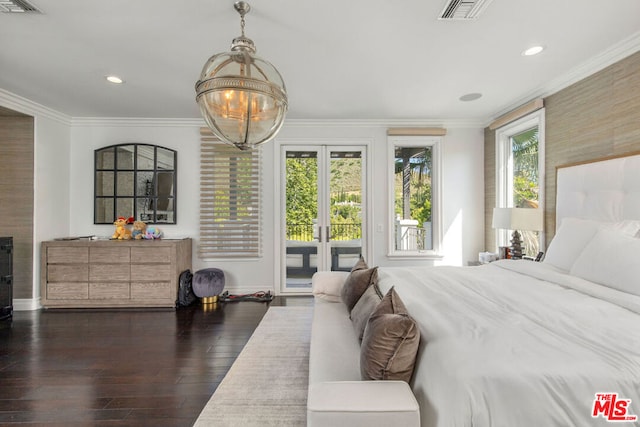 bedroom featuring dark hardwood / wood-style flooring, access to exterior, ornamental molding, and french doors