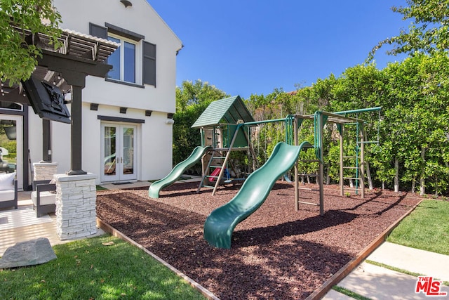 view of playground with french doors