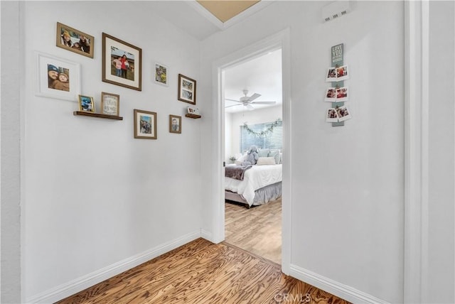 corridor featuring light hardwood / wood-style flooring