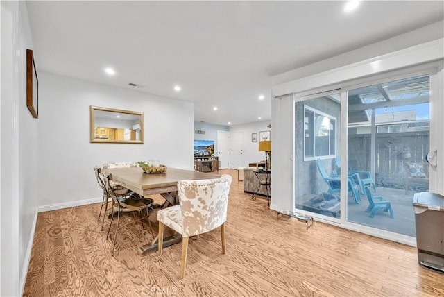 dining area featuring light hardwood / wood-style floors