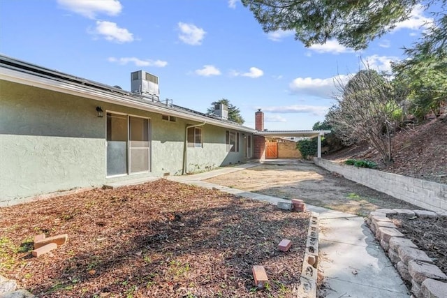 view of yard featuring a patio and cooling unit