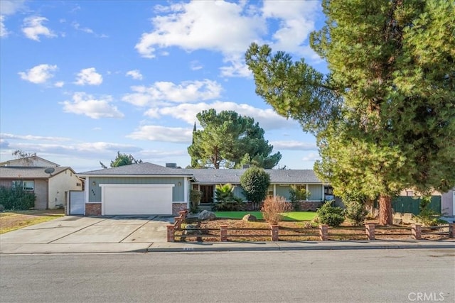 ranch-style house featuring a garage