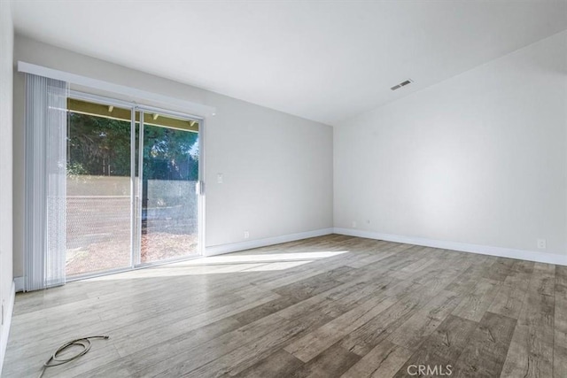 empty room featuring light hardwood / wood-style floors