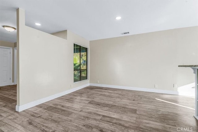 unfurnished living room with light wood-type flooring