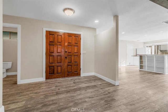 entrance foyer with light wood-type flooring