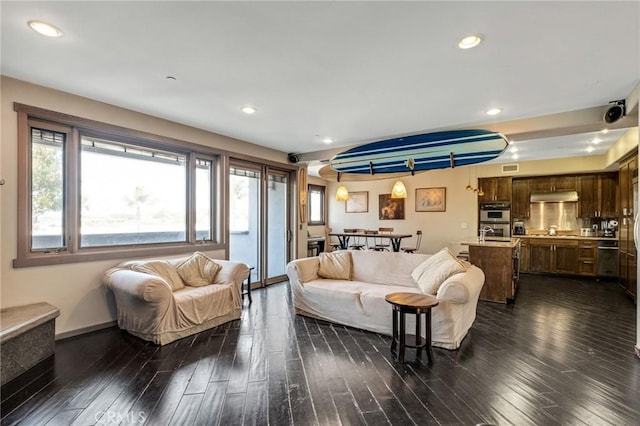 living room with dark wood-type flooring