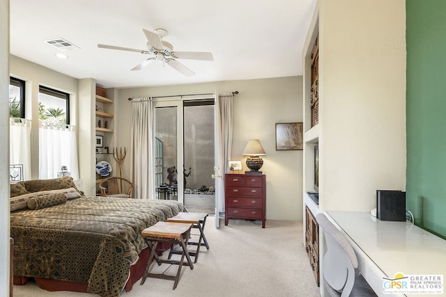 bedroom with access to outside, light colored carpet, and ceiling fan