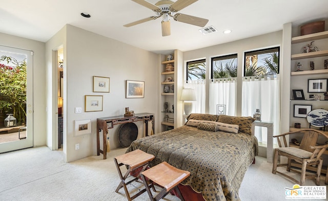 carpeted bedroom with ceiling fan and access to outside