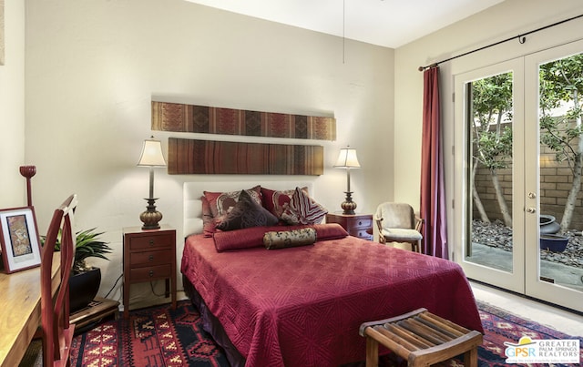 bedroom featuring french doors and access to exterior