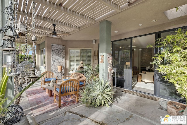 view of patio featuring a pergola and ceiling fan