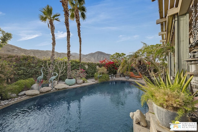 view of pool featuring a mountain view