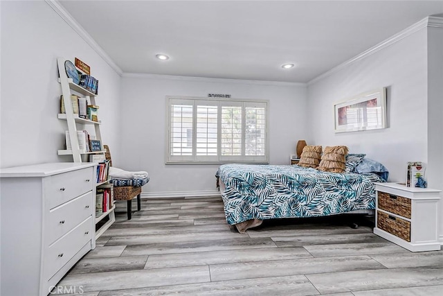 bedroom with crown molding, recessed lighting, baseboards, and light wood-type flooring