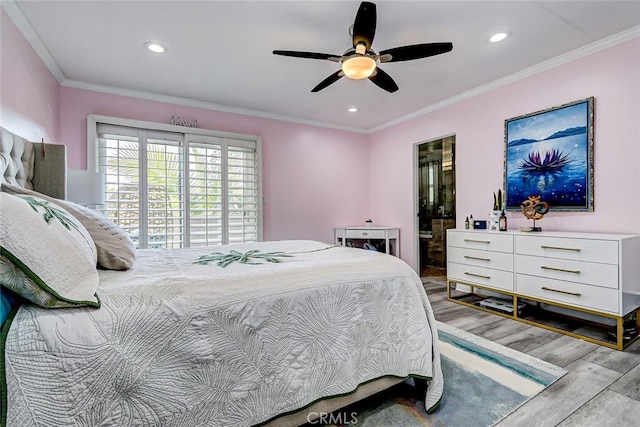 bedroom with connected bathroom, ornamental molding, ceiling fan, and light wood-type flooring