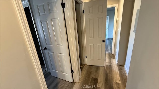 hall featuring dark wood-type flooring