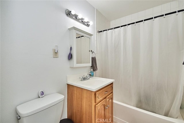 full bathroom with shower / tub combo with curtain, vanity, and toilet