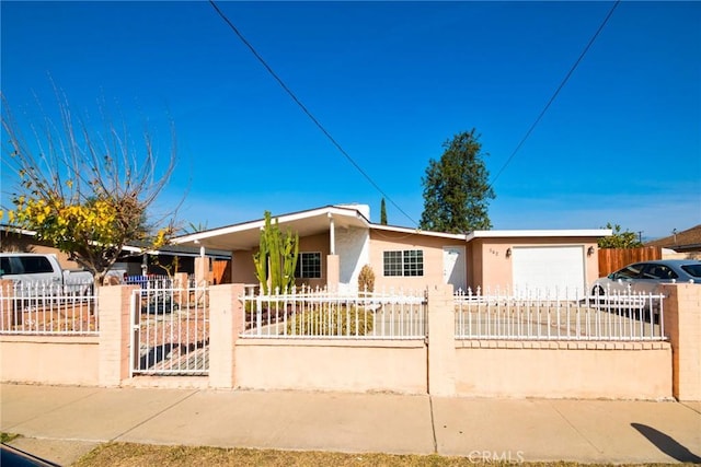 ranch-style house featuring a garage