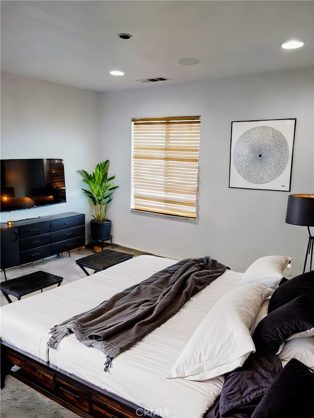 bedroom with visible vents and recessed lighting