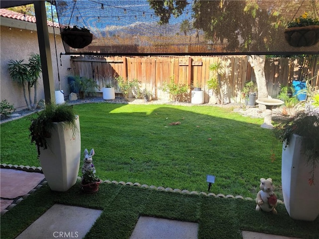 view of yard with fence