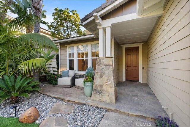 property entrance with a patio