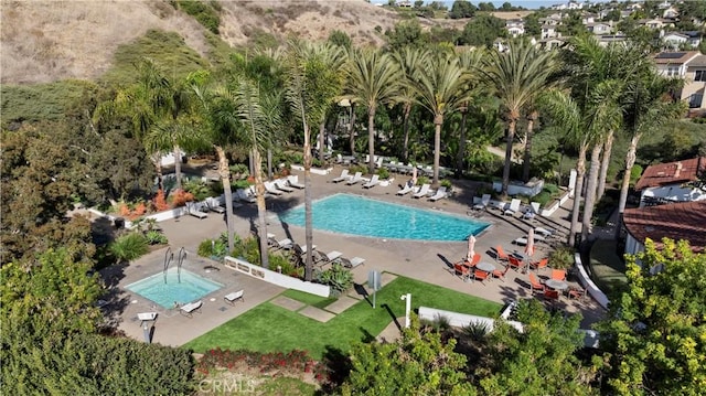 view of pool featuring a patio