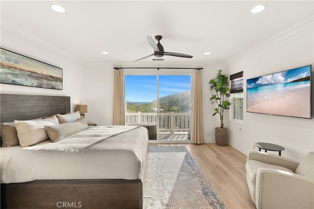 bedroom with ceiling fan, ornamental molding, light hardwood / wood-style floors, and access to exterior