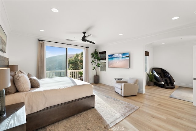 bedroom with ceiling fan, ornamental molding, light wood-type flooring, and access to outside