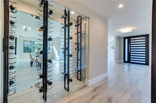 wine room featuring hardwood / wood-style flooring