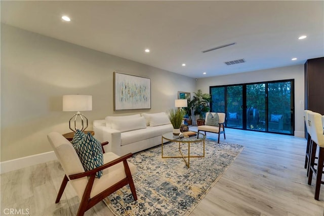 living room featuring light wood-type flooring