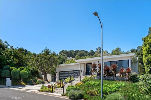 view of front of property with a garage