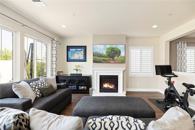 living room with dark wood-type flooring