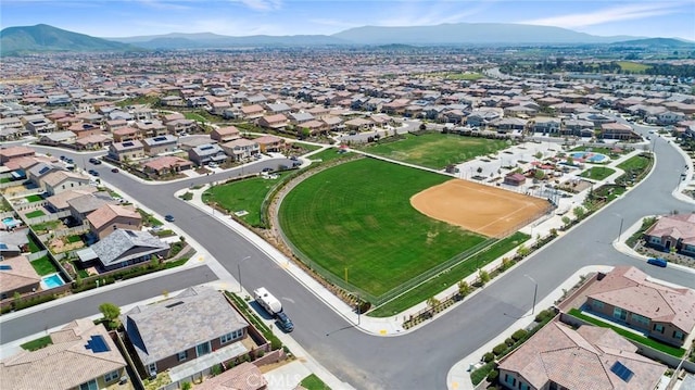 birds eye view of property featuring a mountain view