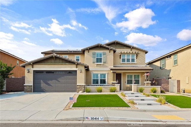 craftsman inspired home featuring a garage