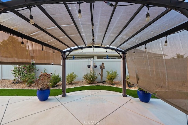 view of patio featuring a pergola