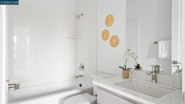 full bathroom featuring shower / bathtub combination, vanity, and toilet