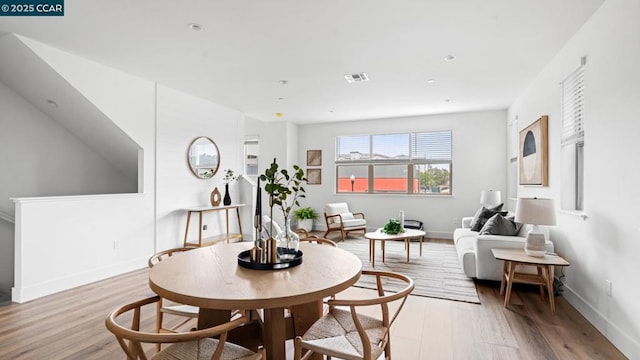 sitting room with light wood-type flooring