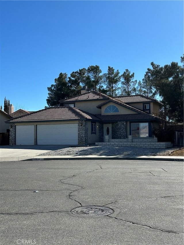 view of front of home featuring a garage